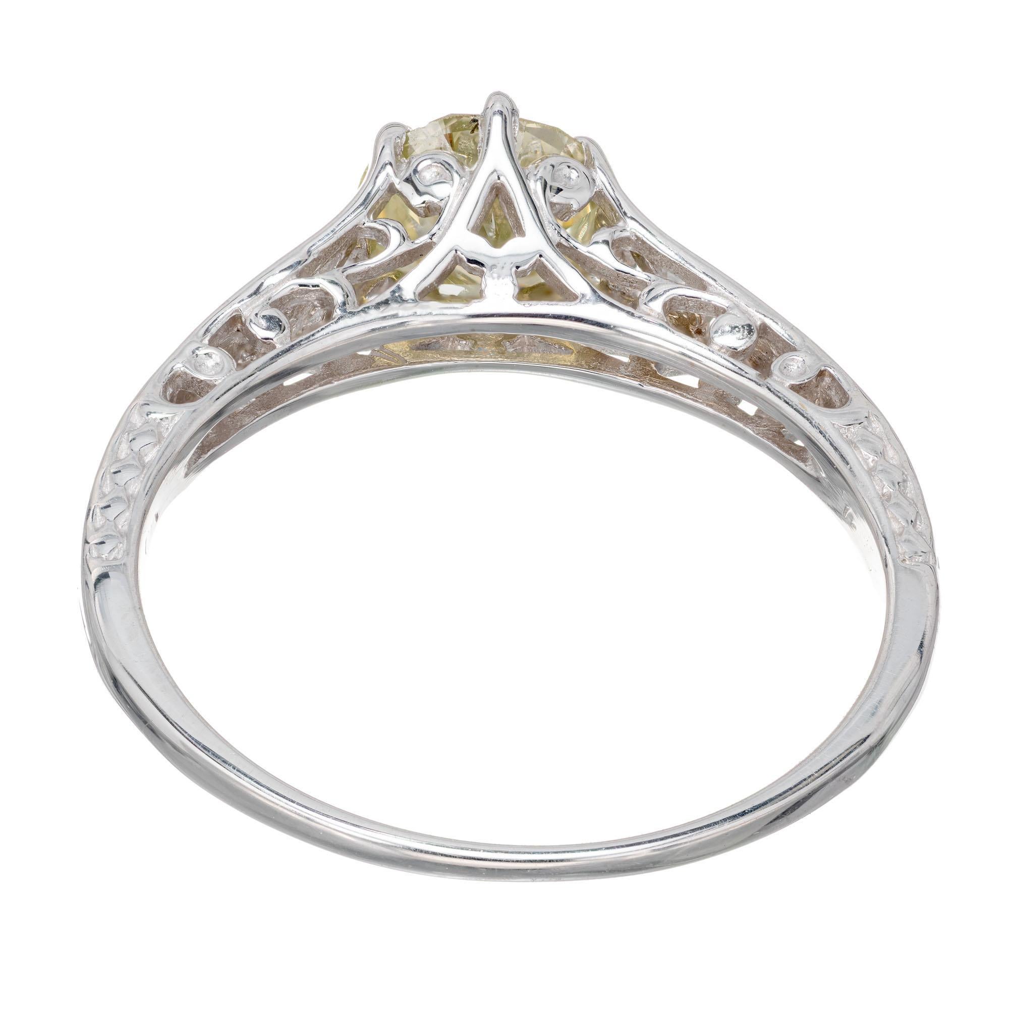 Bague de fiançailles en or blanc avec diamant jaune de 0,65 carat certifié par le GIA Pour femmes en vente