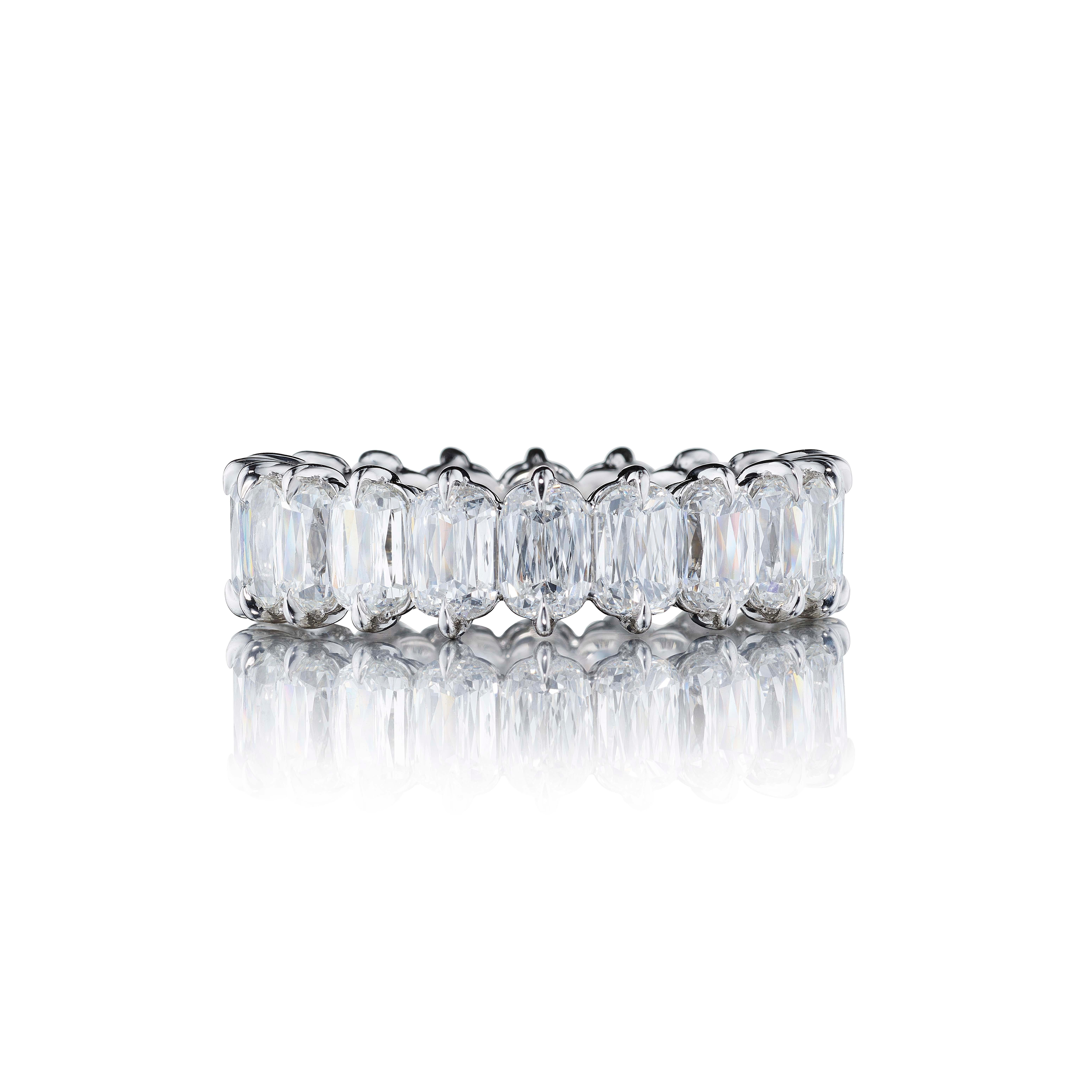 20 Diamants taille coussin pesant 6.50 Carats. Les pierres sont de couleur D-F et de clarté VS-VVS.
En platine.

La bague peut être légèrement ajustée ou une nouvelle monture peut être fabriquée pour s'adapter à n'importe quelle taille de