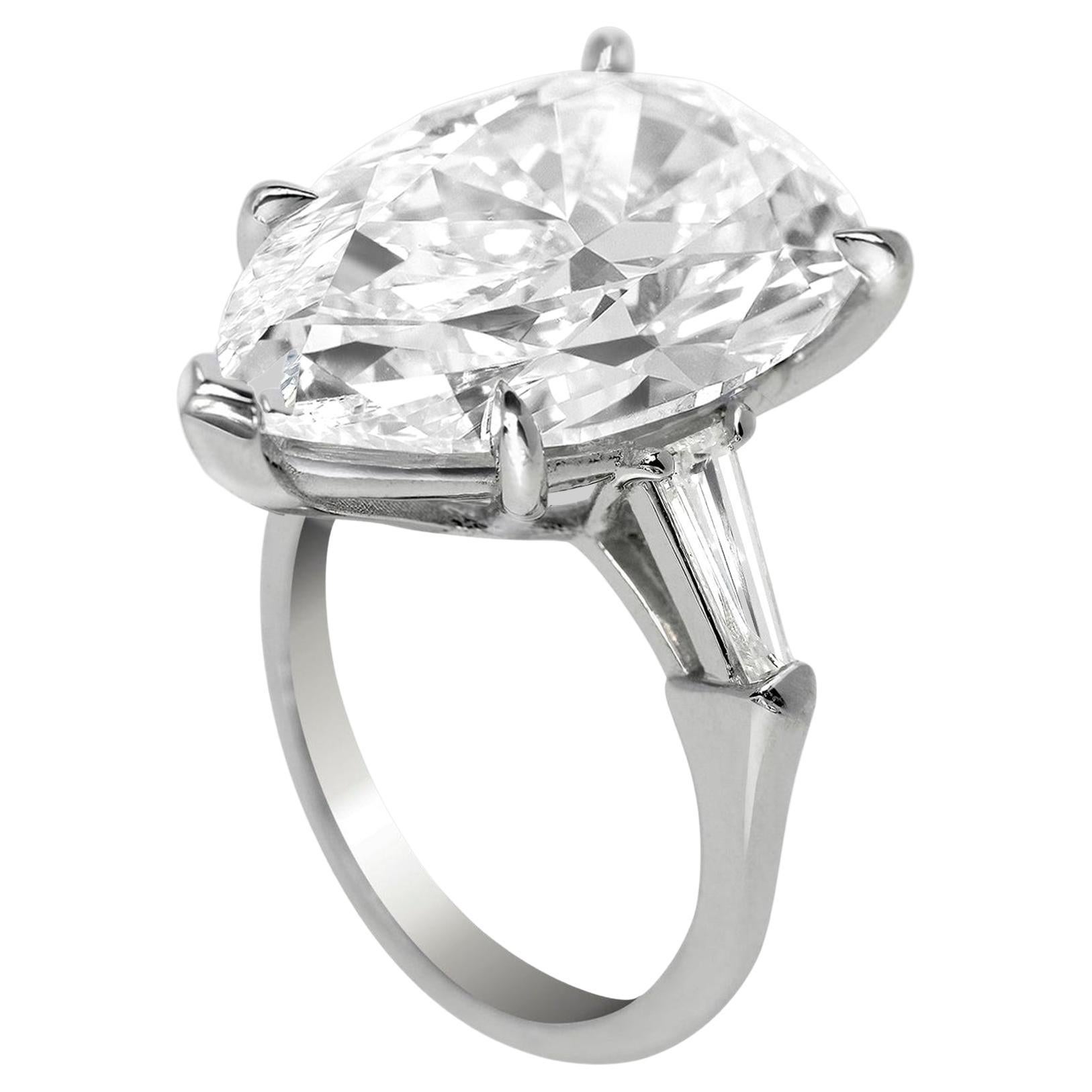 GIA Certified 6.51 Carat Natural Pear Brilliant Cut Diamond.
This Beautiful Diamond has a Maximum grade for color and has graded flawless for the Clarity.
Platinum Engagement Ring Featuring a 6 Carat Pear-Cut Diamond (GIA Report) As flawless Clarity