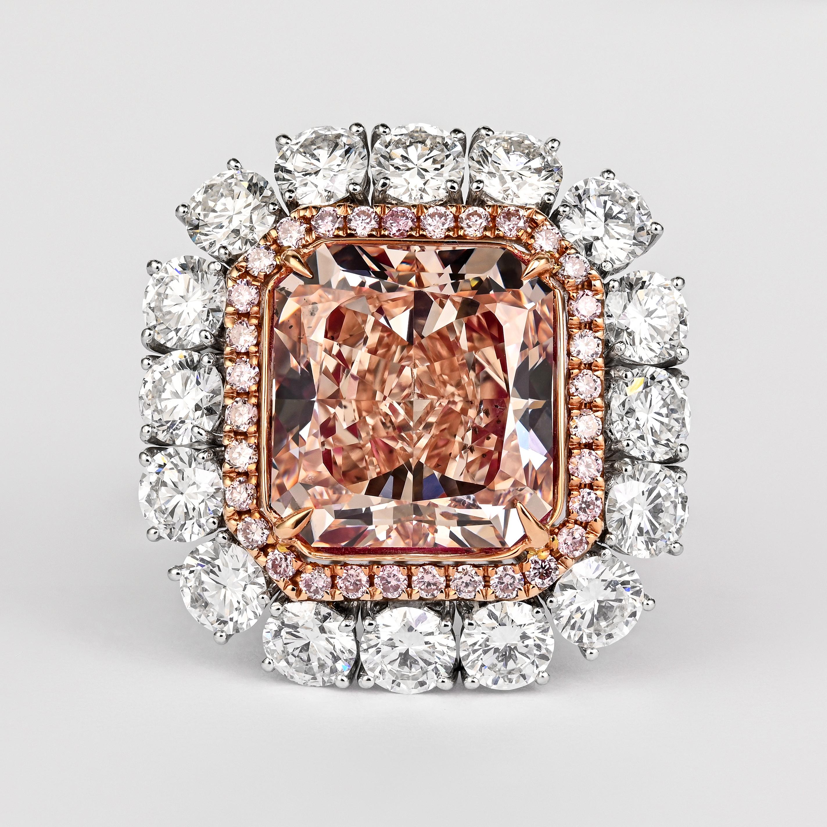 GIA Certified Diamond Ring in 18K Rose and White Gold. 

GIA certified natural pink-brown diamond, weighing 6.53 carats, with a cut-cornered rectangular shape. Adorned with 26 natural pink diamonds totaling 0.28 carats and paired with 16 round-cut