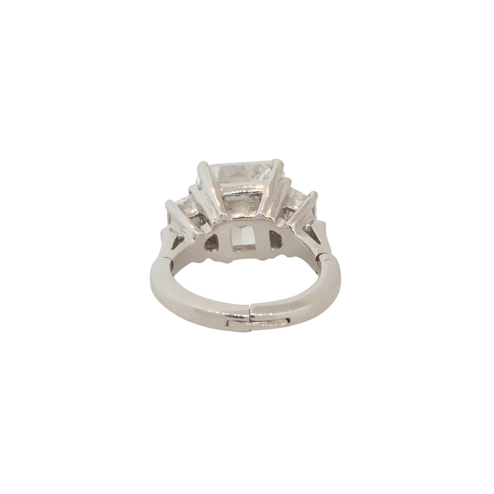 Details for this engagement ring: GIA Certified Platinum 6.53 Carat Radiant Cut Diamond Engagement Ring

Material: Platinum
Diamond Details: The center stone is a 5.03 carat Radiant Cut Diamond. The center diamond is E in color and SI1 in