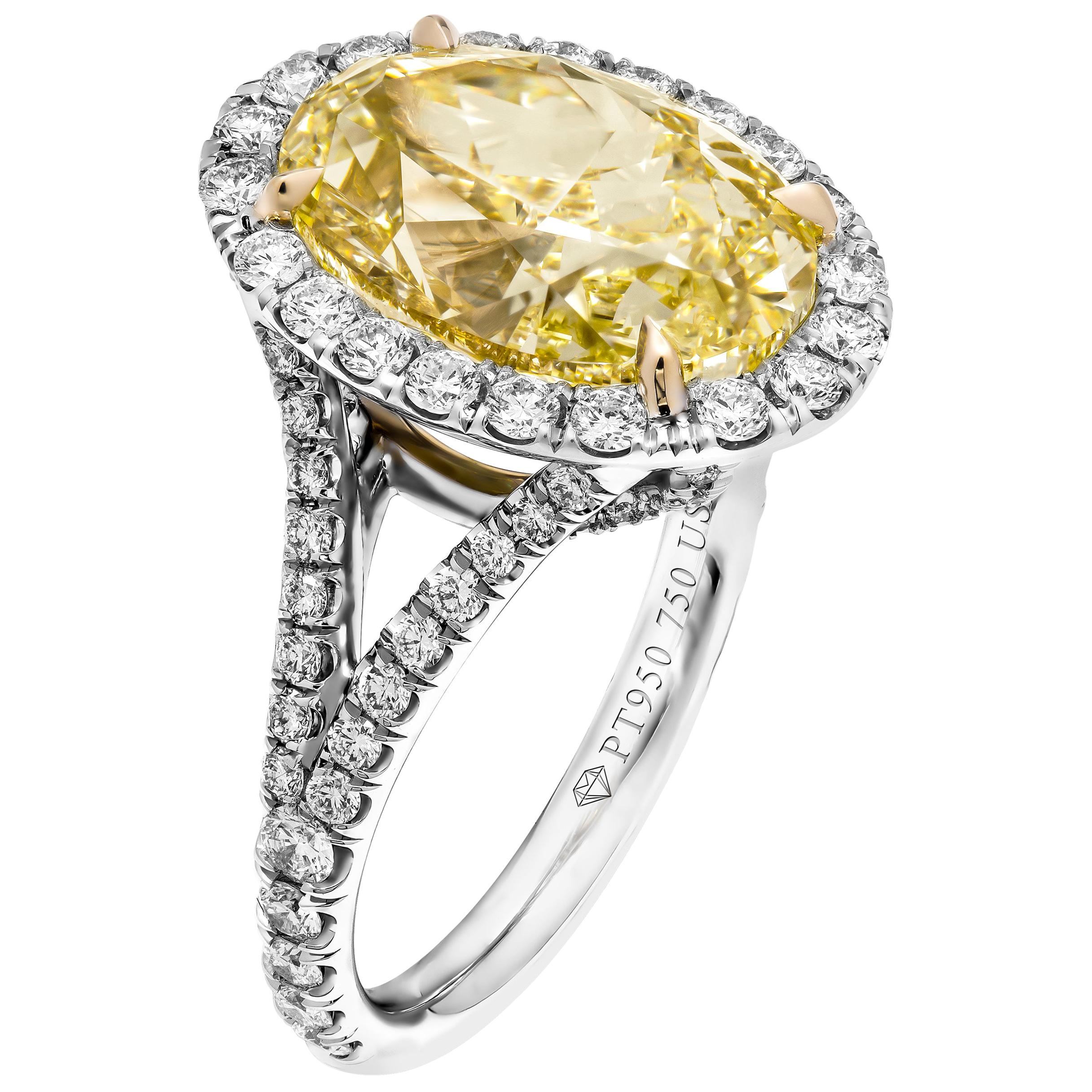 GIA Certified 6.54 Carat Oval Fancy Yellow Diamond Ring