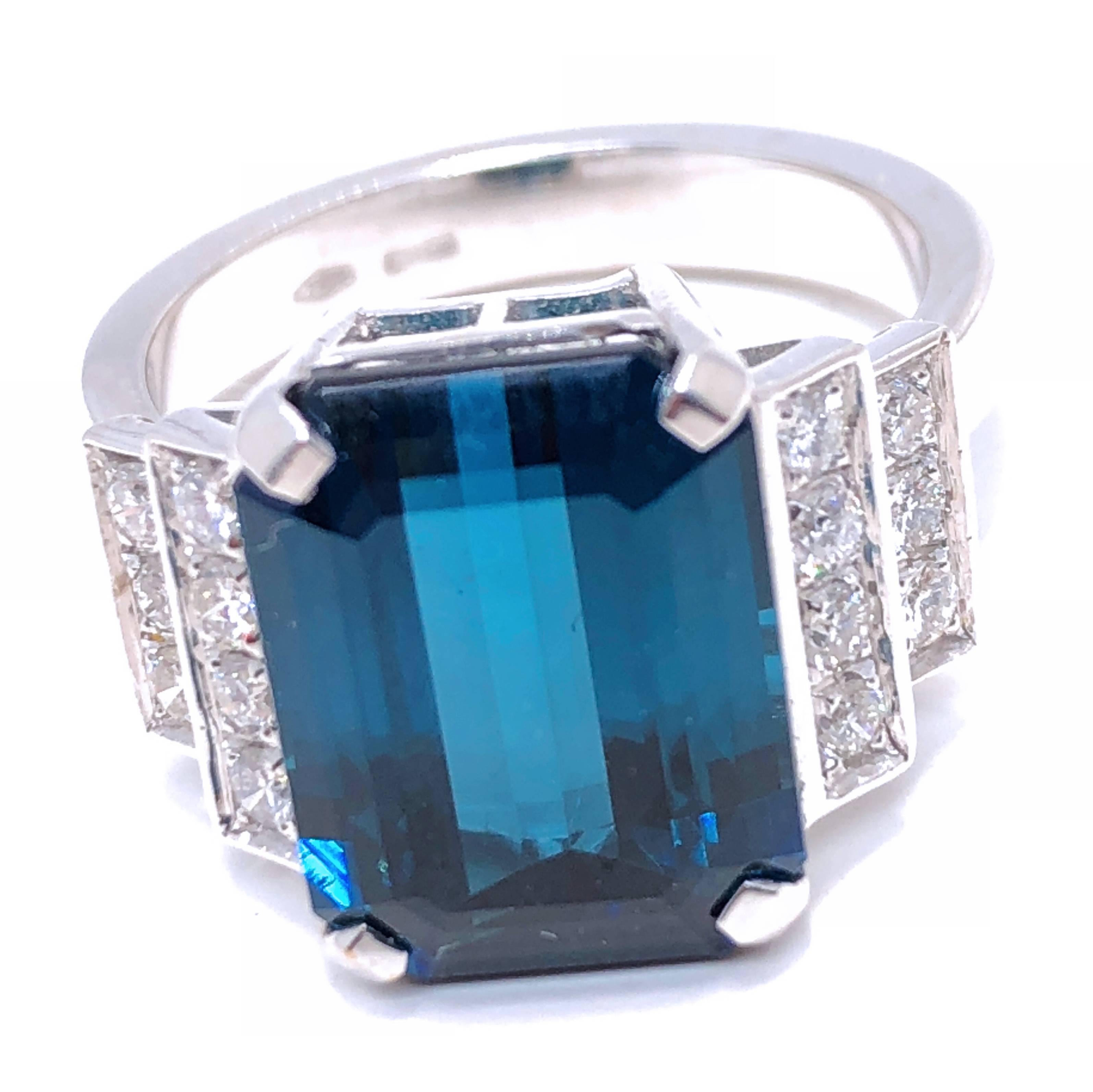 One-of-a-kind Octagonal Cut Indicolithe, a Rare Indigo-Blue Tourmaline (0.5122x0.385x0.228inches) in a chic and timeless White Diamond (0.34kt, D-E VVs1) 18 kt White Gold Setting. The color of this beautiful stone is absolutely natural, not