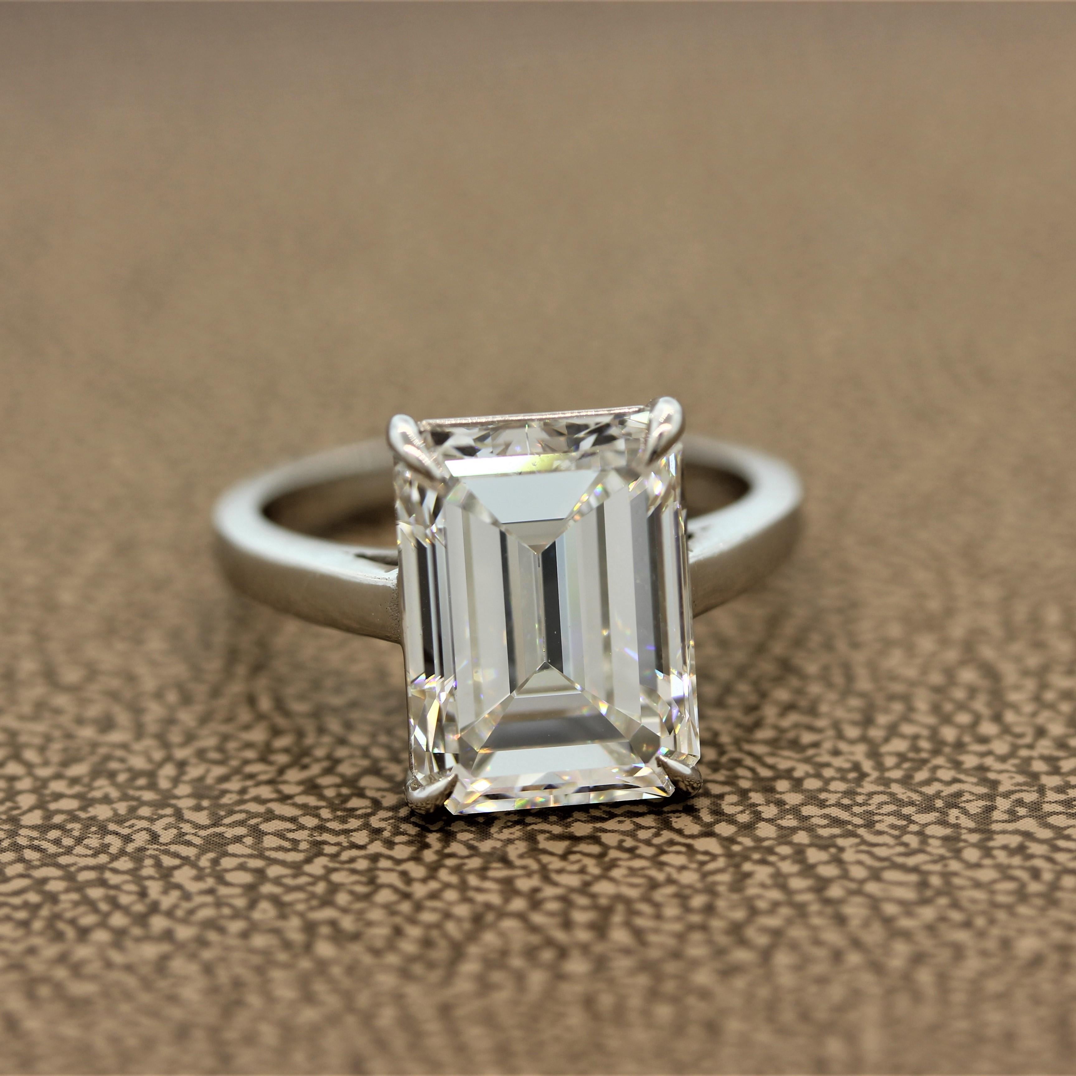 A simple yet striking ring featuring a 6.58 carat emerald cut diamond graded by the GIA as a H color with VS1 clarity, a marvelous stone. The simple four prong platinum setting allows the bright clean diamond to showcase its natural beauty. The