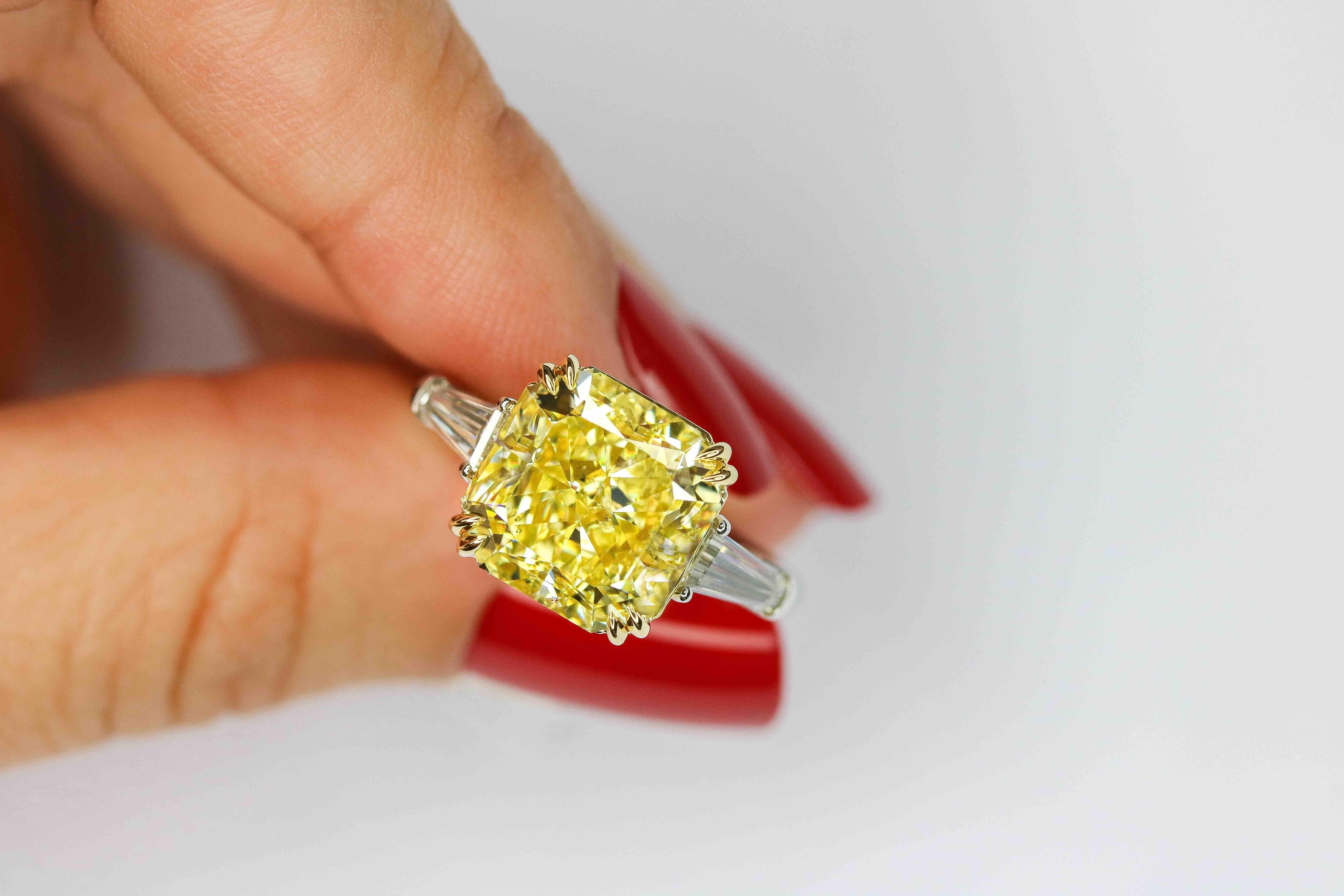 GIA Certified 5.07 Carat Radiant Fancy Yellow Diamond Ring In New Condition For Sale In Calabasas, CA