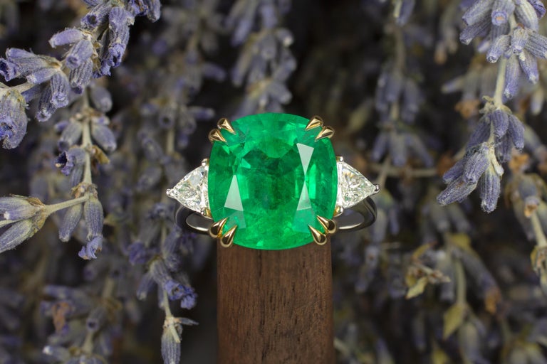 6.60-carat cushion-cut emerald and trillion diamond ring, 2021