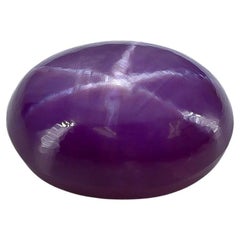 Saphir étoilé violet non chauffé de 6,65 carats certifié GIA