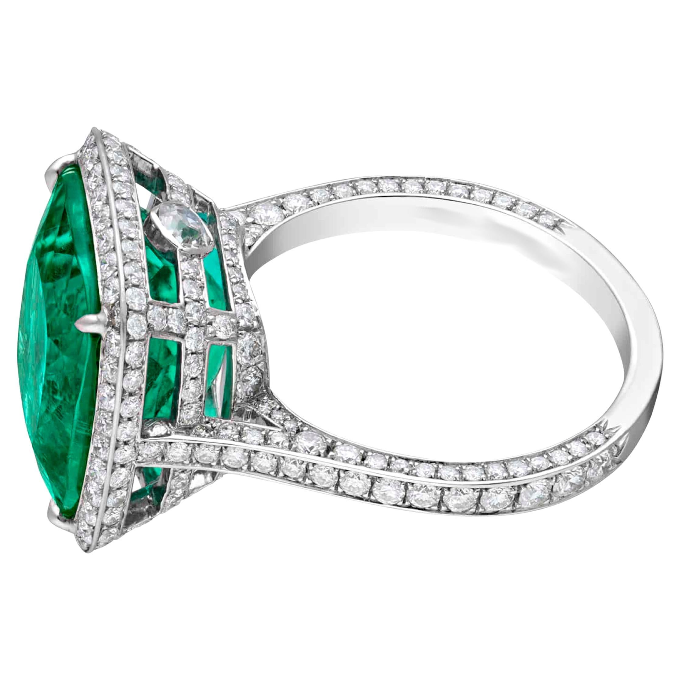 💚 GIA Certified 6.71 Carat Colombian Emerald Ring 💚
An exceptional 6.71 carat Colombian emerald, GIA certified, sits at the heart of this captivating creation — a true statement of timeless elegance and rarity.

✨ Surrounded by 1.00 total carat of