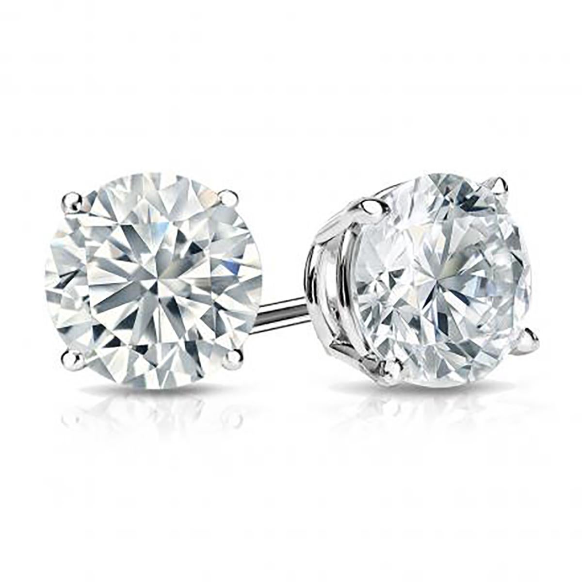 Platinum DIamond Studs with GIA certified 3.32 carat K VS2 round brilliant and GIA certified 3.42 carat K SI2 round brilliant. 6.74 carat total weight.