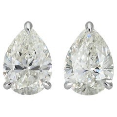 GIA Certified 6.76 Carat Pear Cut Diamond Stud Earrings
