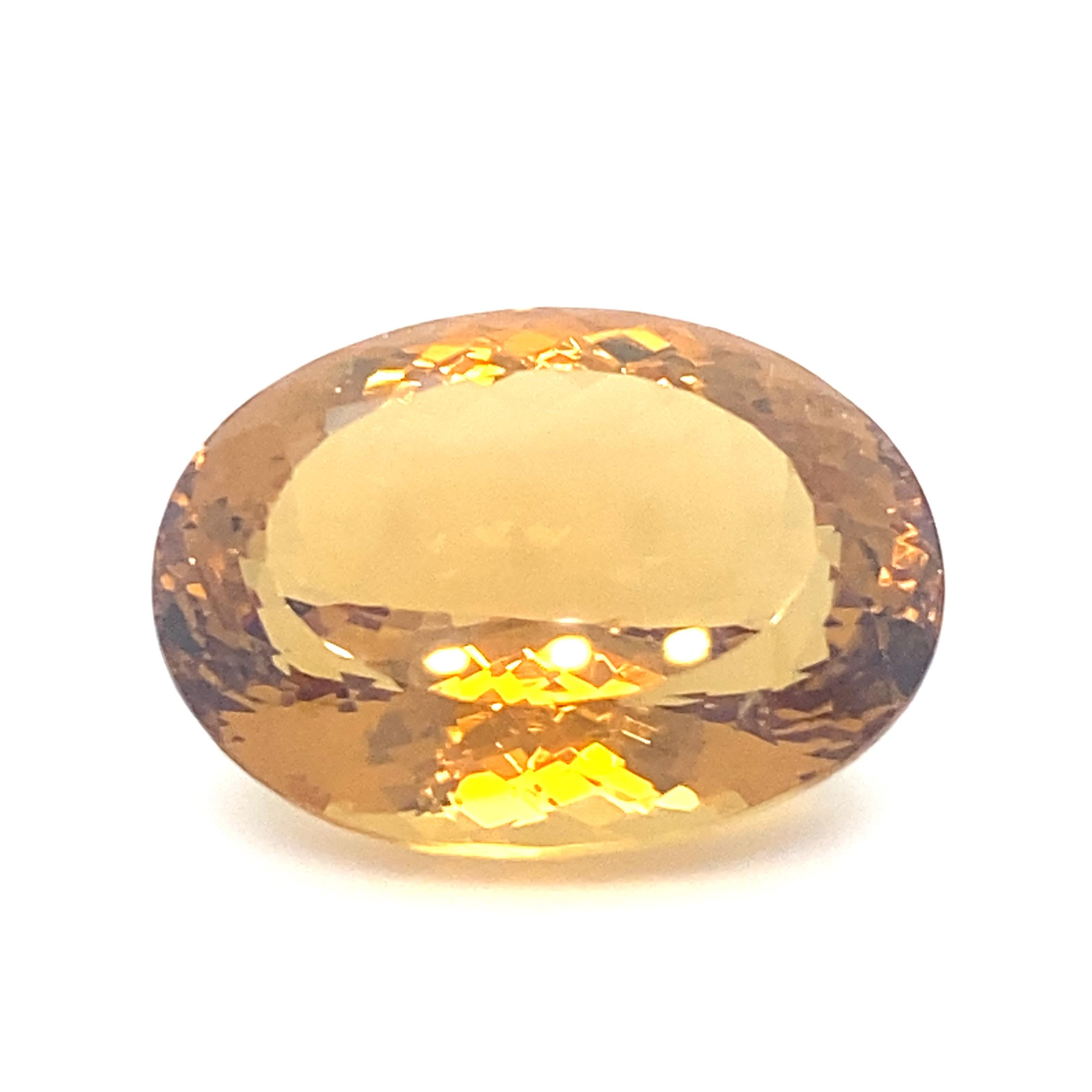 This GIA certified 67.75 Carat Natural Quartz Citrine Oval loose gemstone has modified brilliant cut. It has yellow-orange color and is transparent. Carefully hand cut and hand polished by skilled craftsmen. Turn it into a desirable piece of jewelry