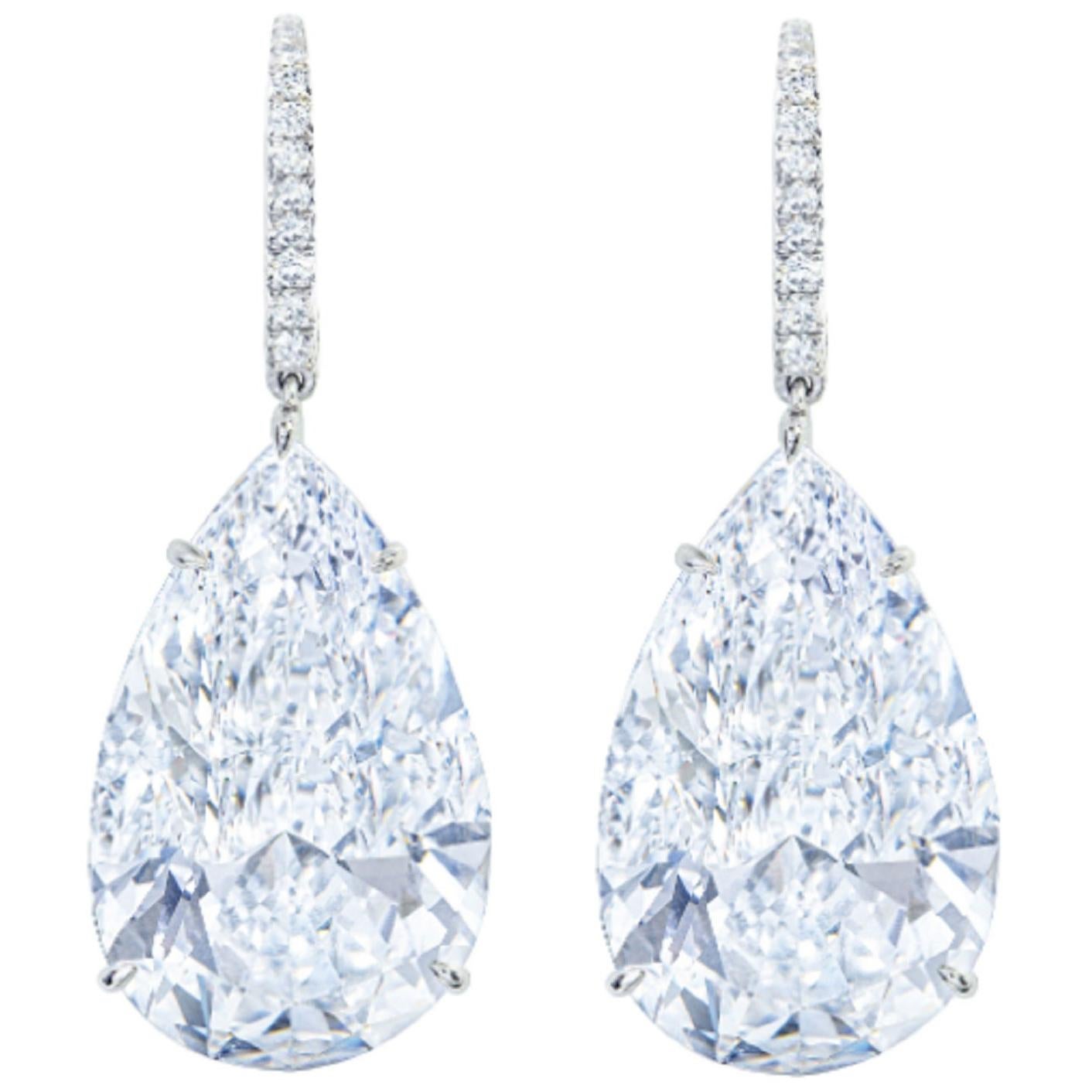 GIA Certified 6.02 Carat Pear Cut Diamond Dangle Earrings