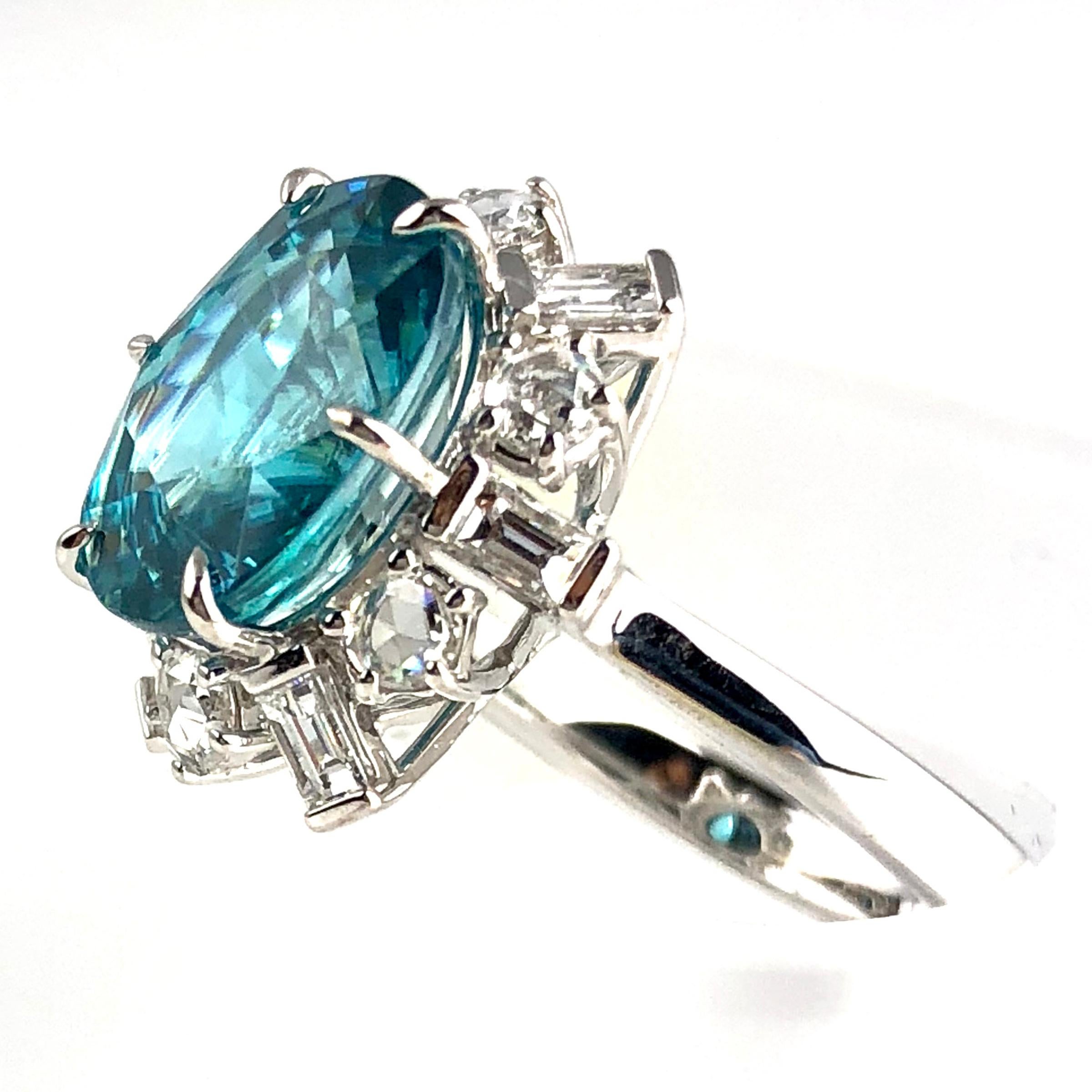 Contemporary GIA Certified 6.85 Carat Oval Cut Blue Zircon and Diamond Ring in 18W ref1313 For Sale