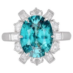 Used GIA Certified 6.85 Carat Oval Cut Blue Zircon and Diamond Ring in 18W ref1313