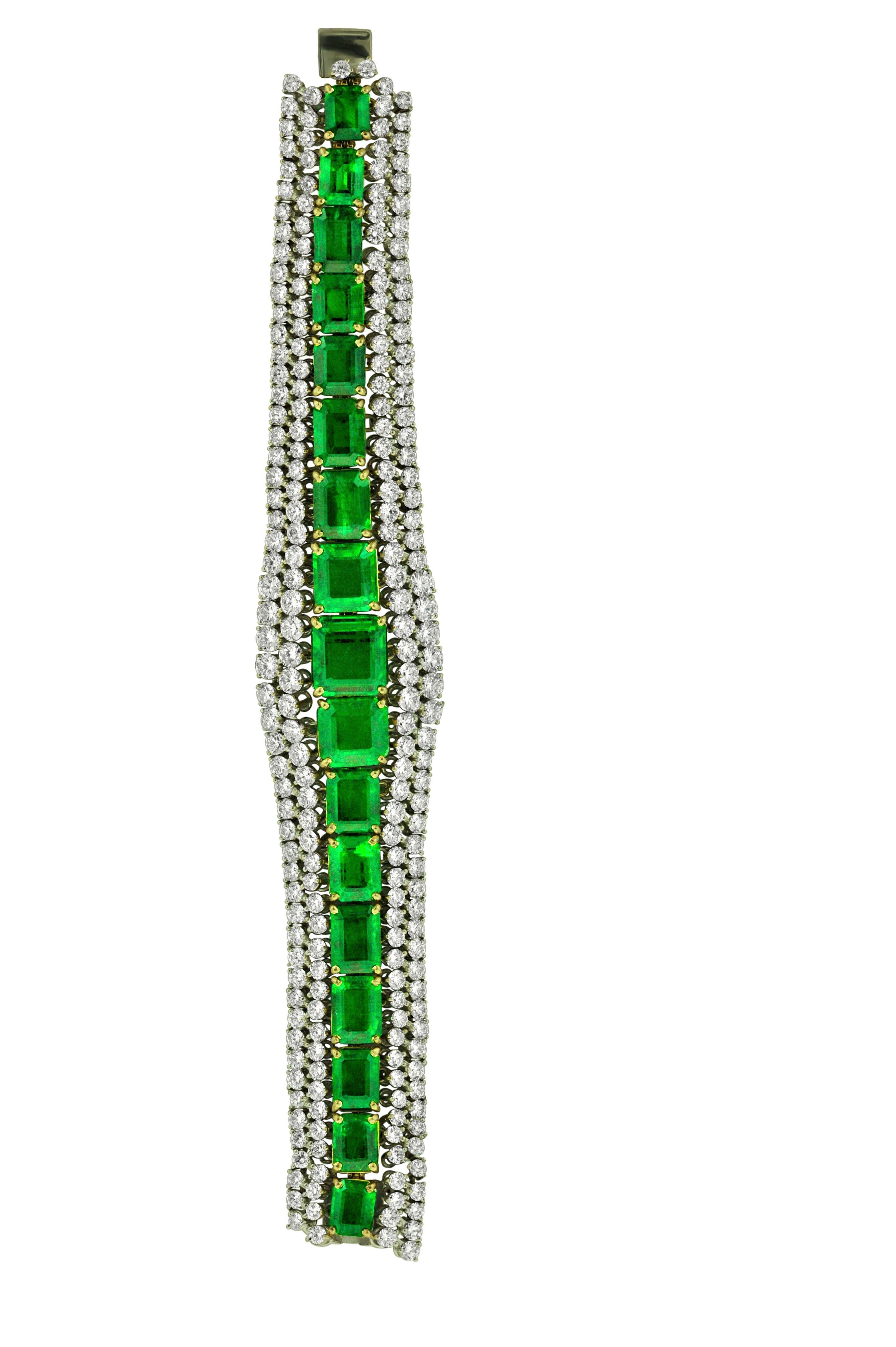 Openwork platinum and 18 kt yellow gold green emerald and diamond bracelet with a center row of 15 GIA certified and 2 uncertified square cut green emeralds totaling 69.29 cts with 2 rows of round diamonds above and below totaling 30.40 cts.