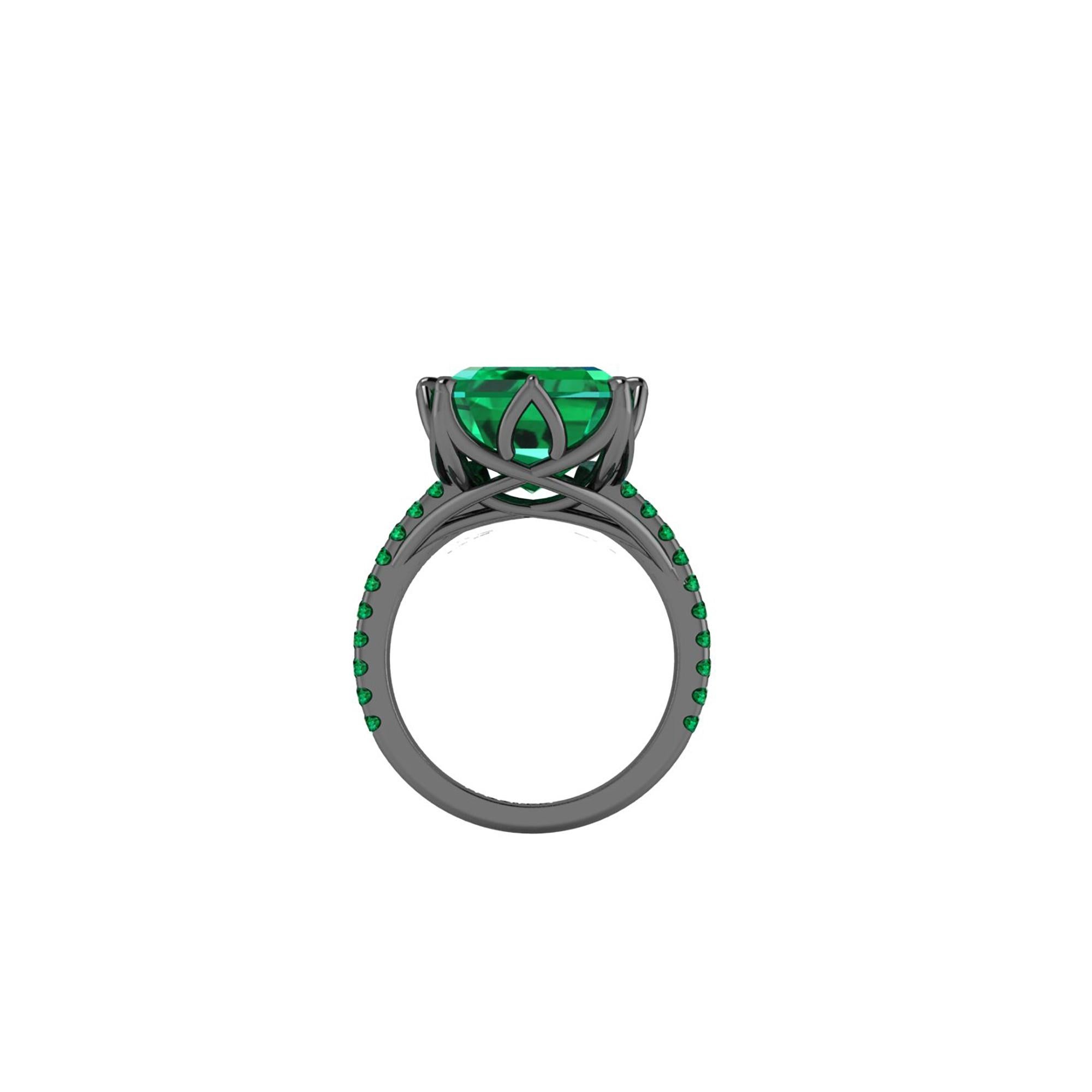 GRS Certified 6.31 carat Colombian emerald cut Emerald, very high quality color,  embellished by a pave' of bright green emeralds of approximately  a total carat weight of 0.32 carat, set in a hand crafted 18k Black gold Maleficent ring, created