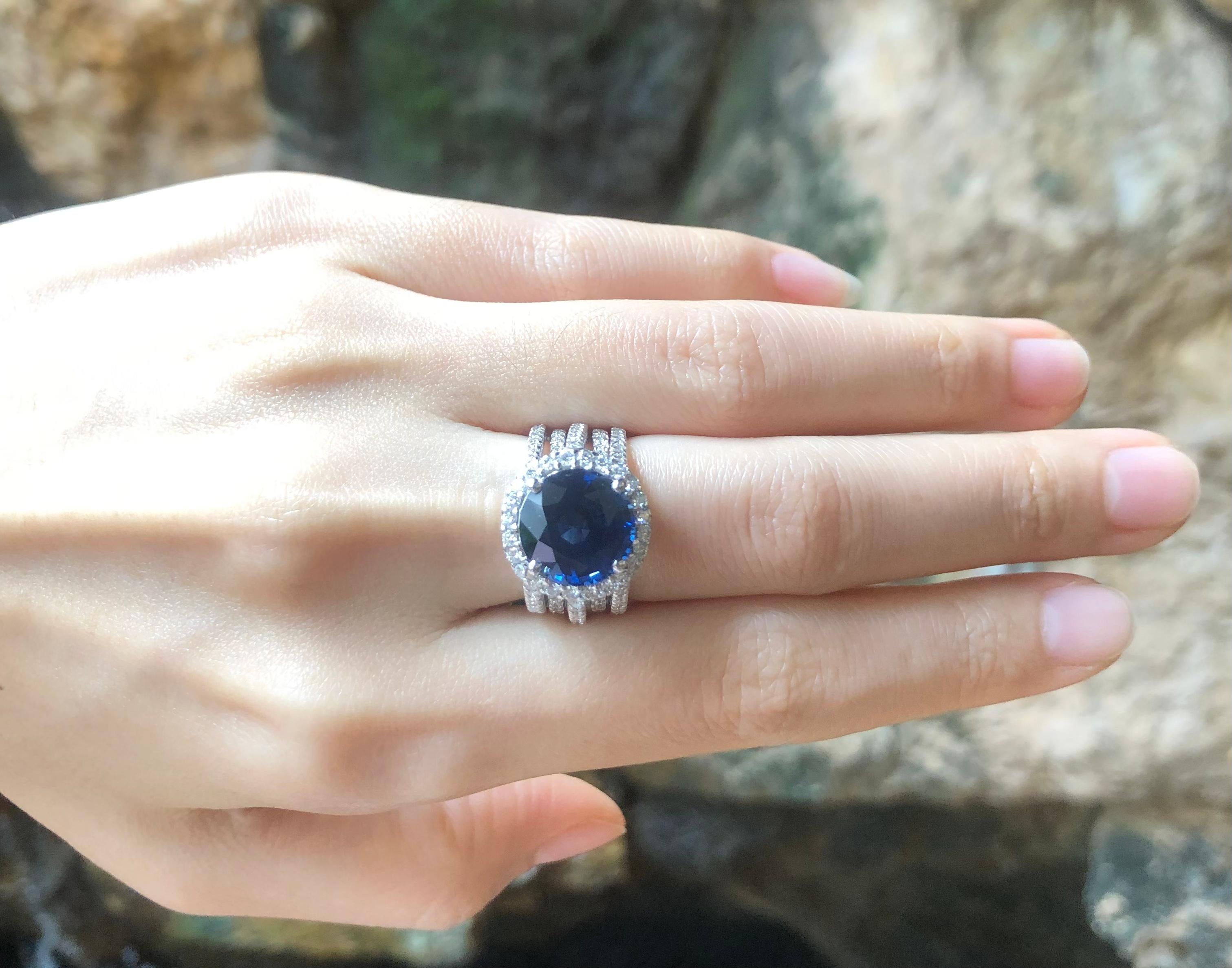 Blue Sapphire 6.29 carats with Diamond 1.66 carats Ring set in 18 Karat White Gold Settings
(GIA Certified) 

Width:  1.4 cm 
Length: 1.4 cm
Ring Size: 52
Total Weight: 12.04 grams

Blue Sapphire 
Width:  1.2 cm 
Length: 1.2 cm


