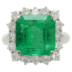GIA Certified 7 Carat Colombian Emerald and Diamond Cocktail Ring