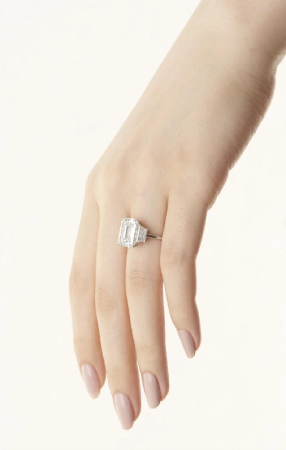 Modern GIA Certified 5 Carat Emerald Diamond Ring