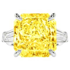 GIA Certified 7 Carat Fancy Intense Yellow Diamond Platinum Ring