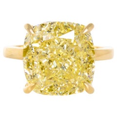 GIA Certified 7 Carat Fancy Yellow Cushion Cut Diamond 18 Carats Gold Ring