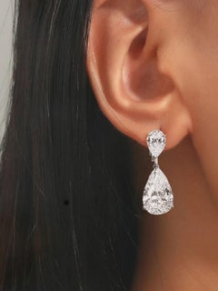 GIA Certified 7 Carat Pear Cut Diamond Dangle Platinum Earrings