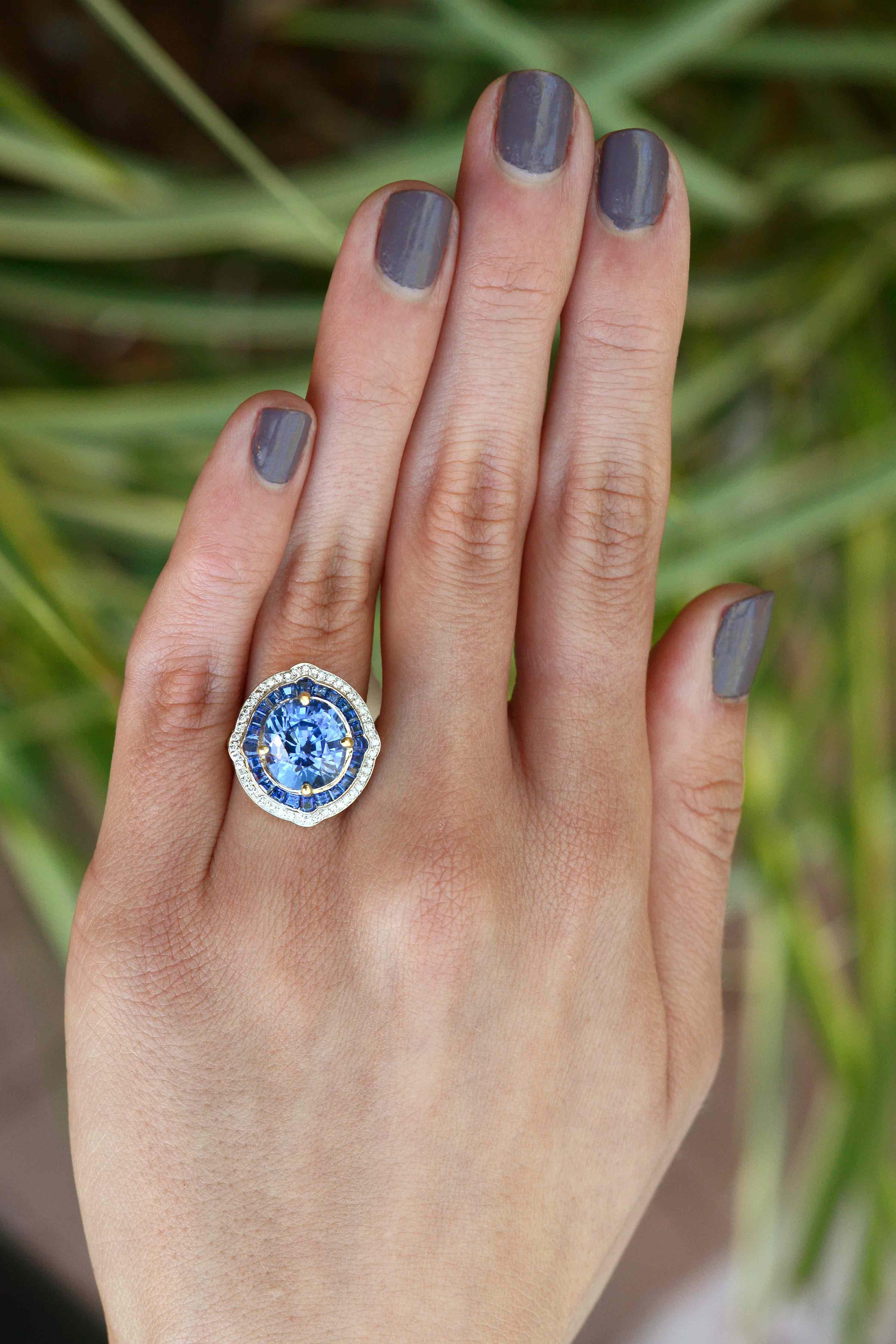 The Plano 7 carat GIA certified natural sapphire centering this magnificent engagement ring only tells part of it's story. With a mesmerizing Ceylon, cobalt blue and a captivating brilliance, this gemstone engagement ring has an almost unbelievable