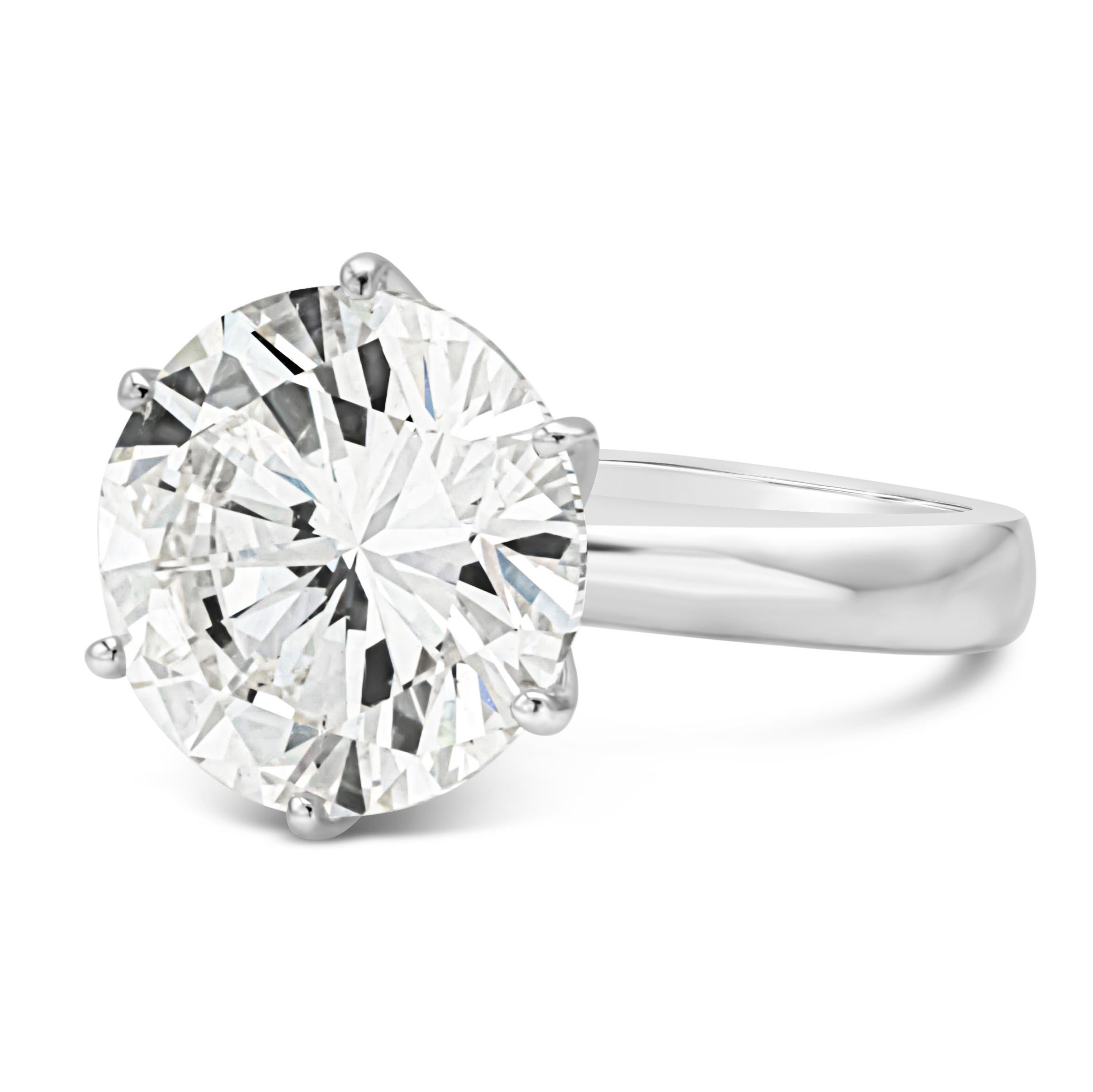 A classic and timeless solitaire engagement ring showcasing a 7.00 carat total round brilliant diamond certified by GIA as L Color, SI2 in Clarity. The diamond is set in a six-prong setting and made in 18k white gold.