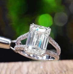 GIA Certified 7.00 Carat Emerald Shape Diamond 18K Gold Solitaire Ring