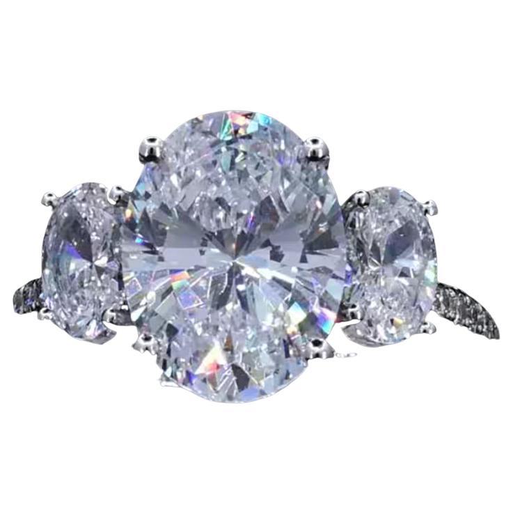 GIA zertifiziert 7,00 Karat F/VS1 Oval Form Diamanten 18K Gold Drei Stein Ring im Angebot