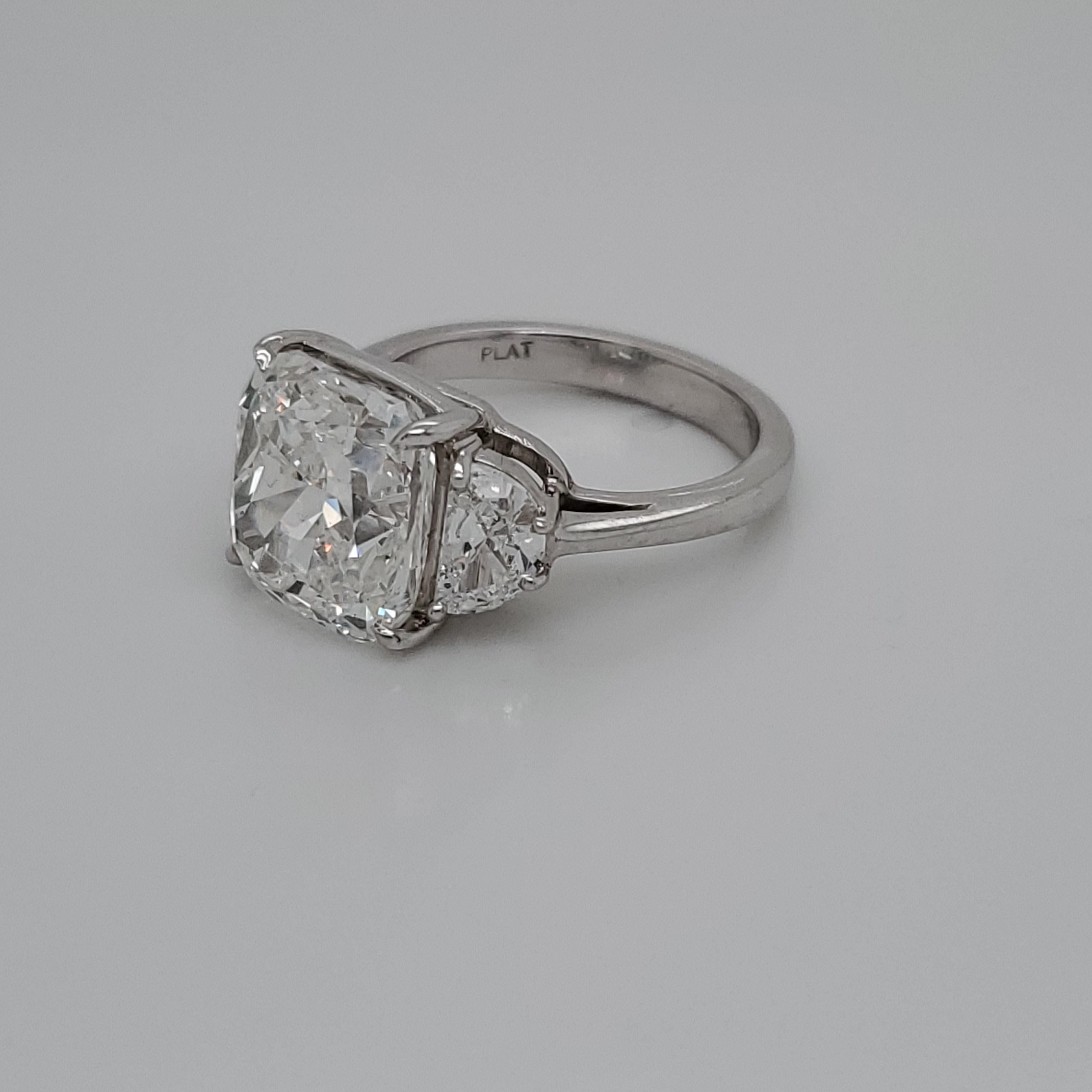 3 stone cushion engagement ring