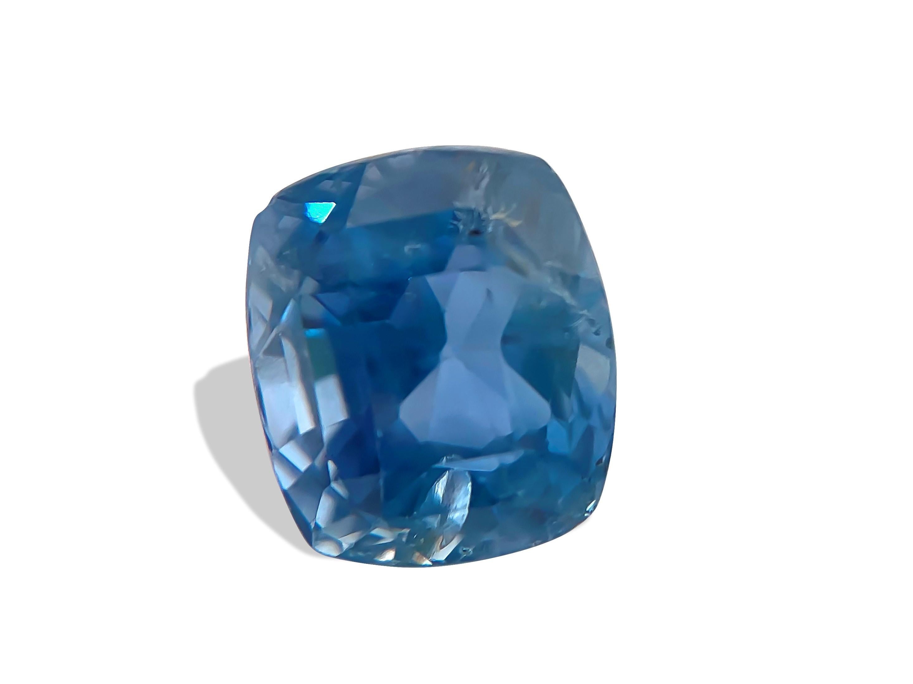 This magnificent blue sapphire, weighing 7.02 carats, is a true natural wonder, untouched by heat treatment, and sourced directly from the earth. Its captivating cushion cut showcases its remarkable beauty, making it a standout piece on its own.
