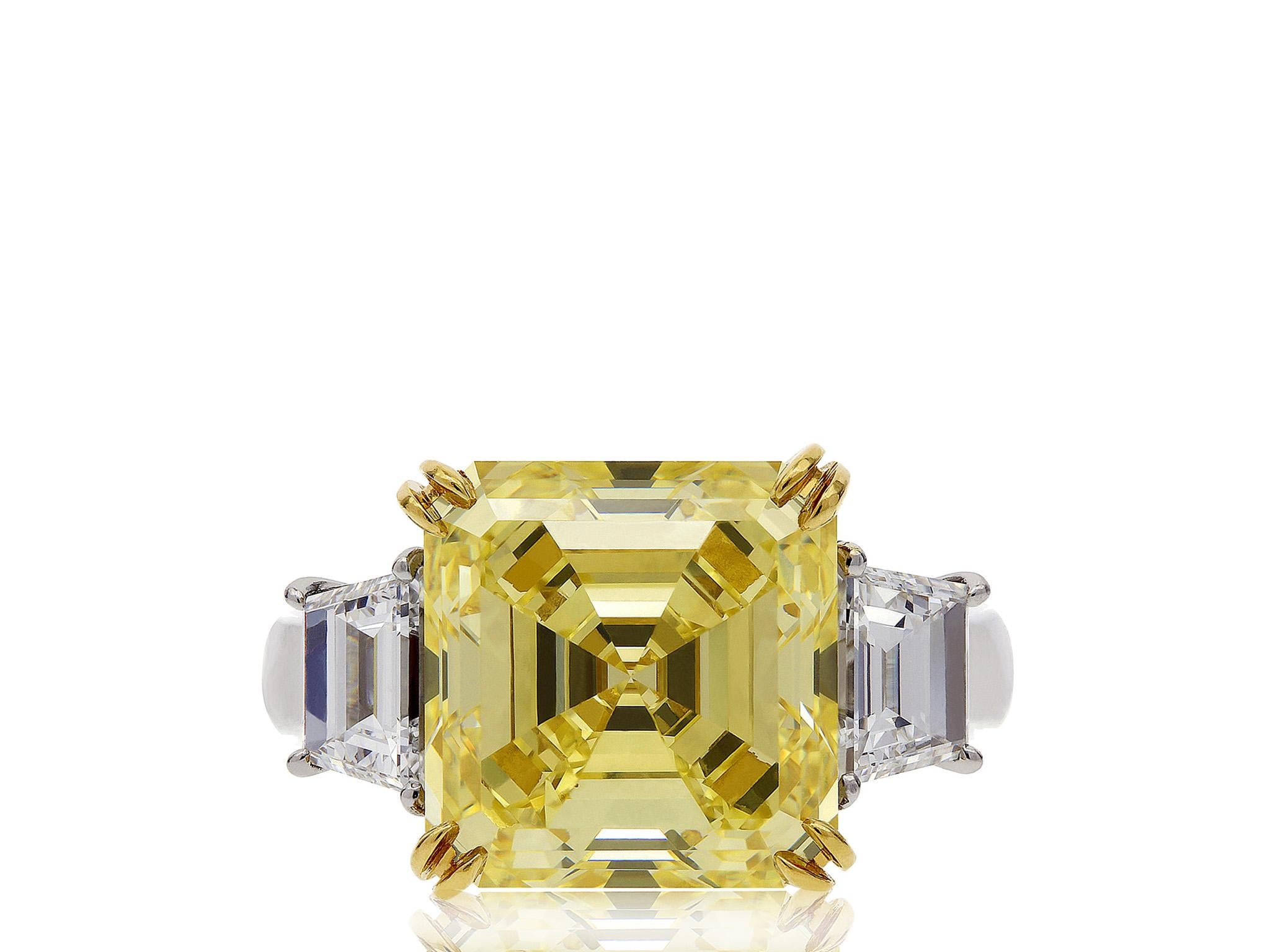 Women's GIA Certified 7.03 Carat Asscher Cut Fancy Yellow VS1 Diamond Platinum Ring For Sale