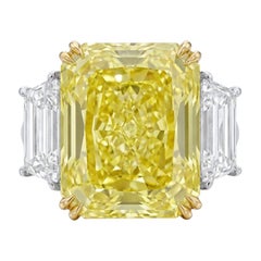 GIA Certified 7.03 Carat Fancy Intense Yellow Diamond Ring