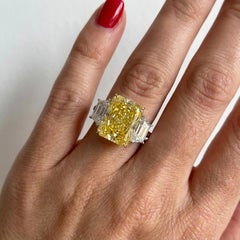 GIA Certified 7.03 Carat Fancy Intense Yellow Diamond Trapezoid Ring