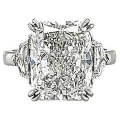 GIA Certified 7.08 Carat Radiant Cut Diamond Three Stone Ring