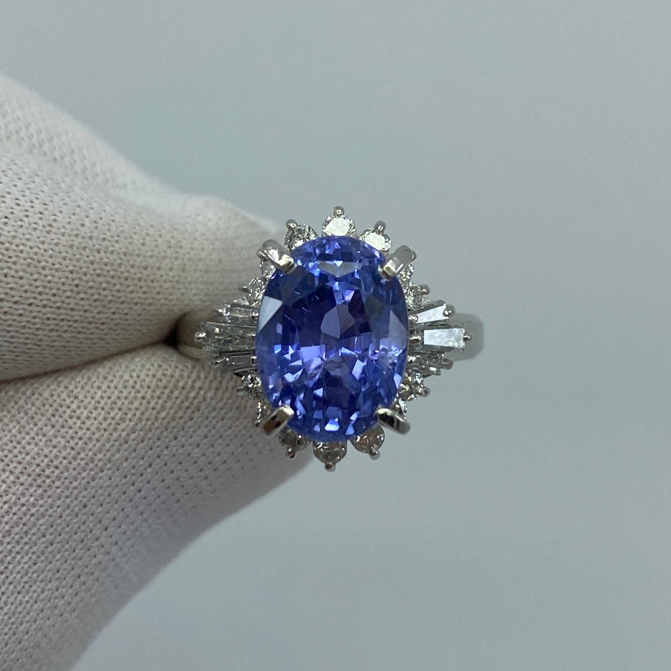Rare Colour Change Sapphire And Diamond Platinum Ring.

Unique 6.51ct colour change sapphire. Fully certified by GIA, confirming stone as untreated and having colour change effect.
Changes colour from a violet-blue in white light/daylight to purple