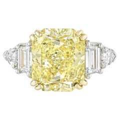 GIA Certified 7.08 Carats Fancy Intense Yellow Radiant Diamond Engagement Ring
