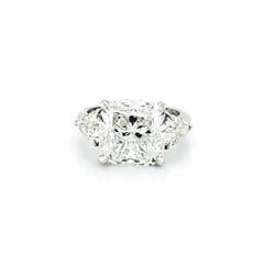 GIA Certified 7.10 Carat Cushion Cut Diamond Three-Stone Ring