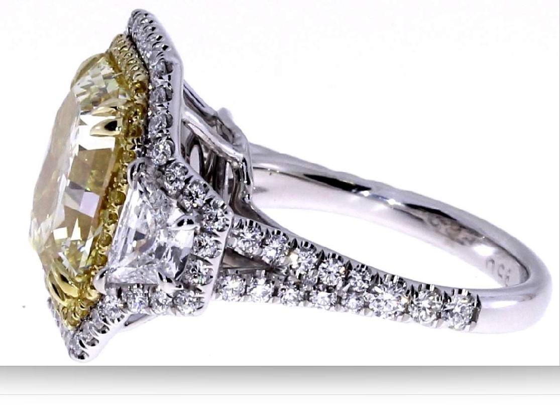 Women's GIA Certified 7.11ct Fancy Yellow Radiant Cut Diamond Ring in Platinum
