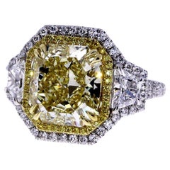 Used GIA Certified 7.11ct Fancy Yellow Radiant Cut Diamond Ring in Platinum