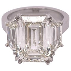 Anello di fidanzamento con diamante taglio smeraldo certificato GIA da 7.14 carati
