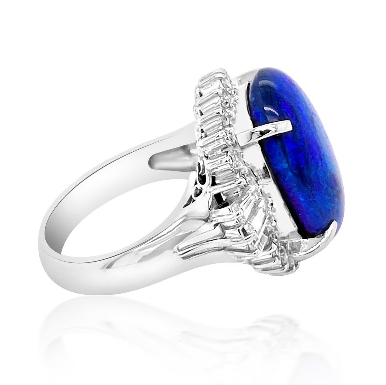Platinum : 11.80gm 
Natural Australian Black Fire opal : 7.17ct
Natural Diamonds : 0.70ct
GIA # 2215138442
Delicately mounted in GIA Certified Platinum with 11.80gm weight, this rare natural Australian 7.17ct black fire opal has been said to be