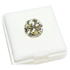 GIA Certified 7.20ct Round Brilliant Champagne Yellow Diamond, VS2
