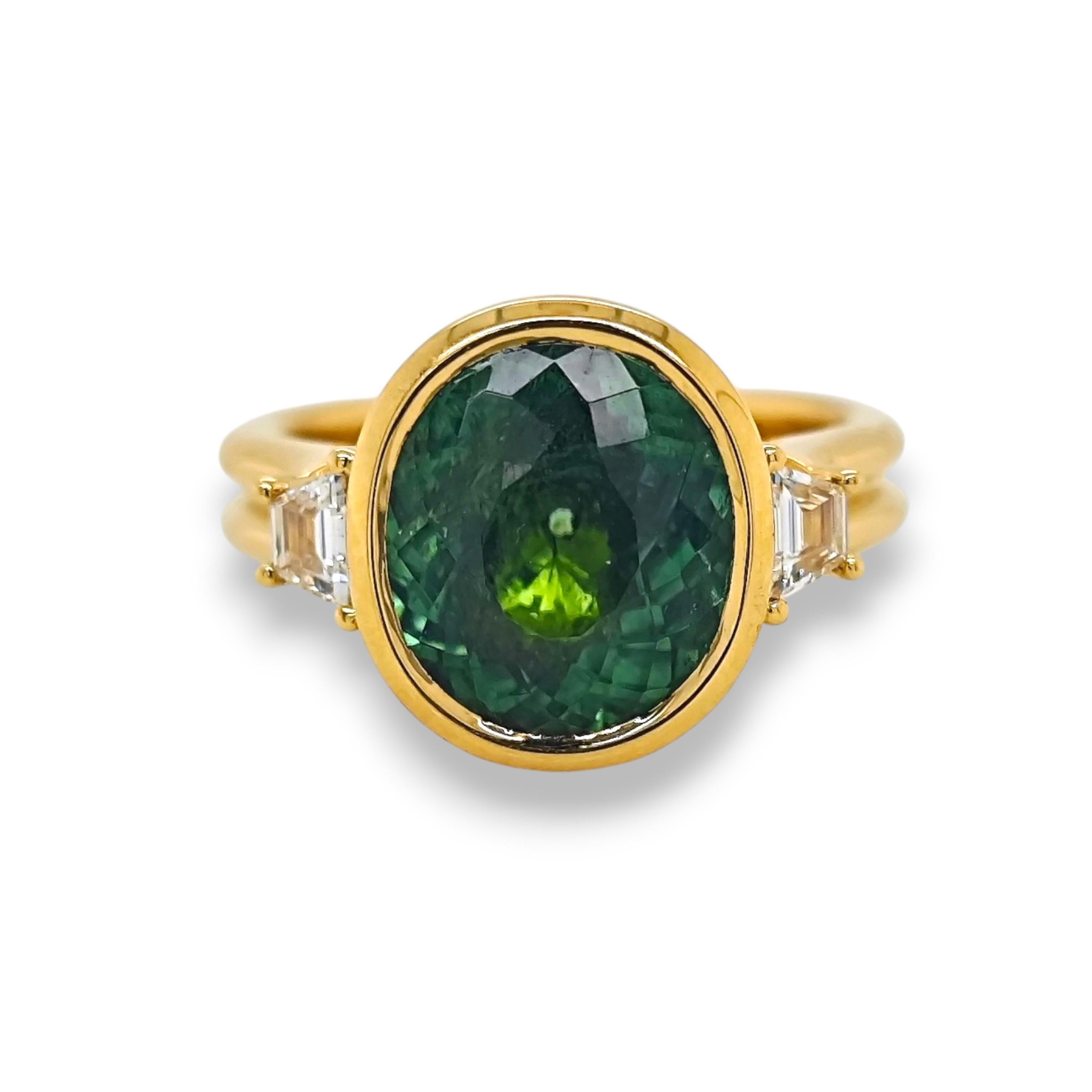 1 Green Oval Paraiba Gemstone: 7.00 Carats
2 White Fancy Diamonds: 0.23 Carats
Metal: 18K Yellow Gold, 7.40 Grams
GIA Certificate # GIA 6233572810
