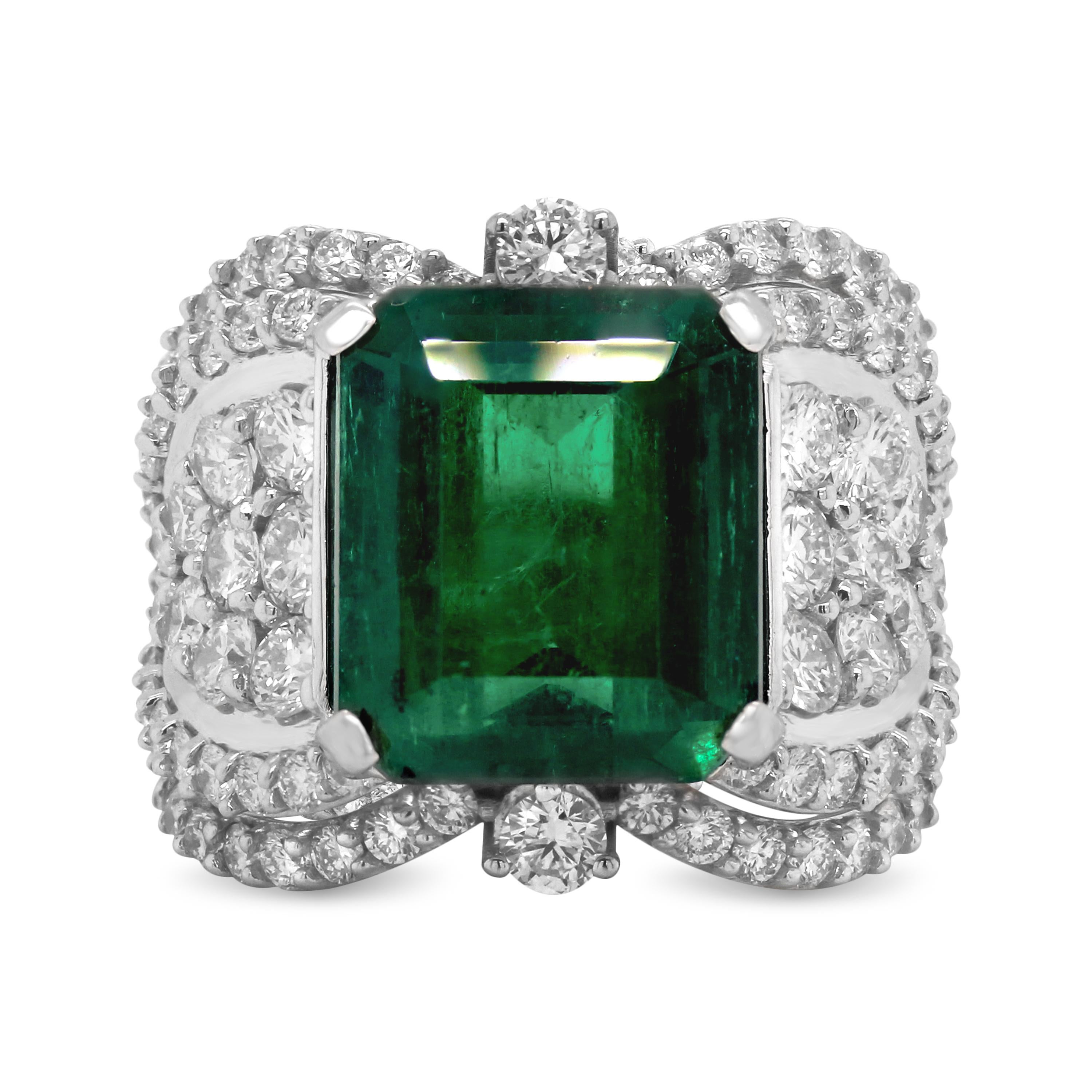 GIA Certified 7.25 Carat Colombian Emerald 18K White Gold Diamond Cocktail Ring 

This one-of-a-kind ring features a 7.25 carat natural Colombian Emerald that is an octagonal cut. GIA certificate states the Emerald is moderate clarity enhanced which