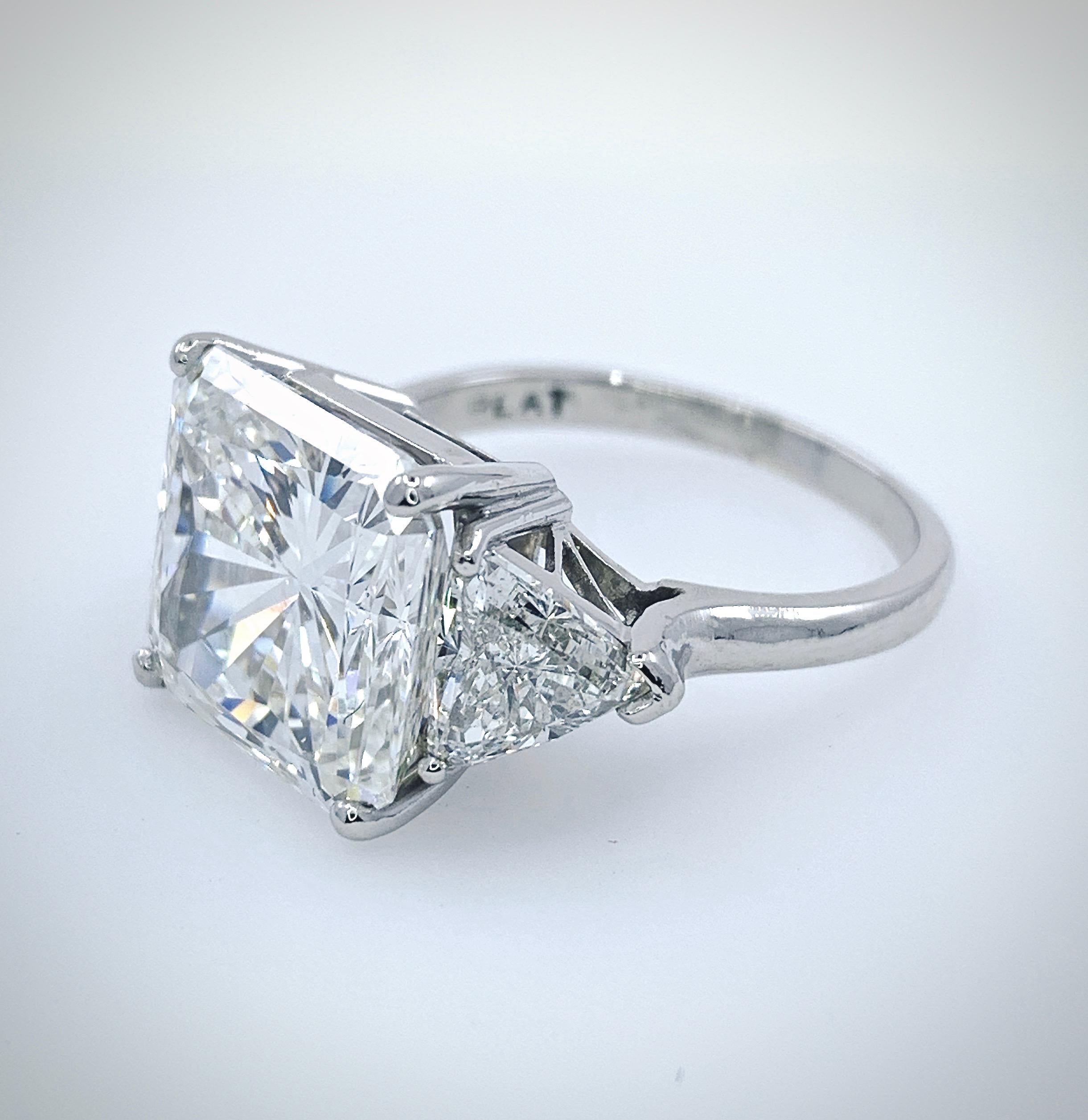 radiant cut engagement ring with trillions
