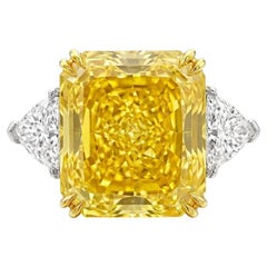 GIA Certified 7.29 Carat Fancy Intense Yellow Internally Flawless Diamond Ring