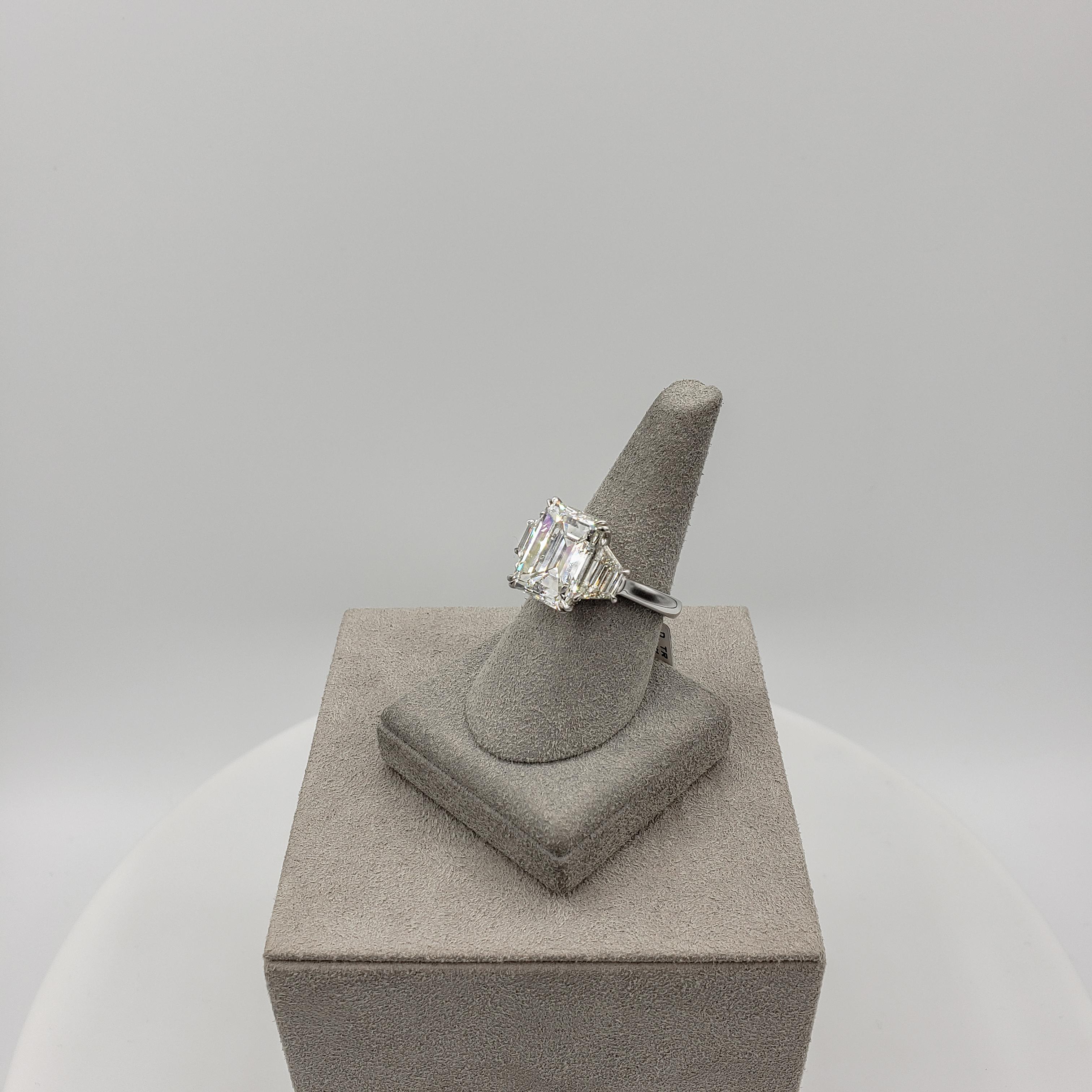 Contemporary GIA Certified 7.31 Carats Emerald Cut Diamond Three-Stone Engagement Ring For Sale