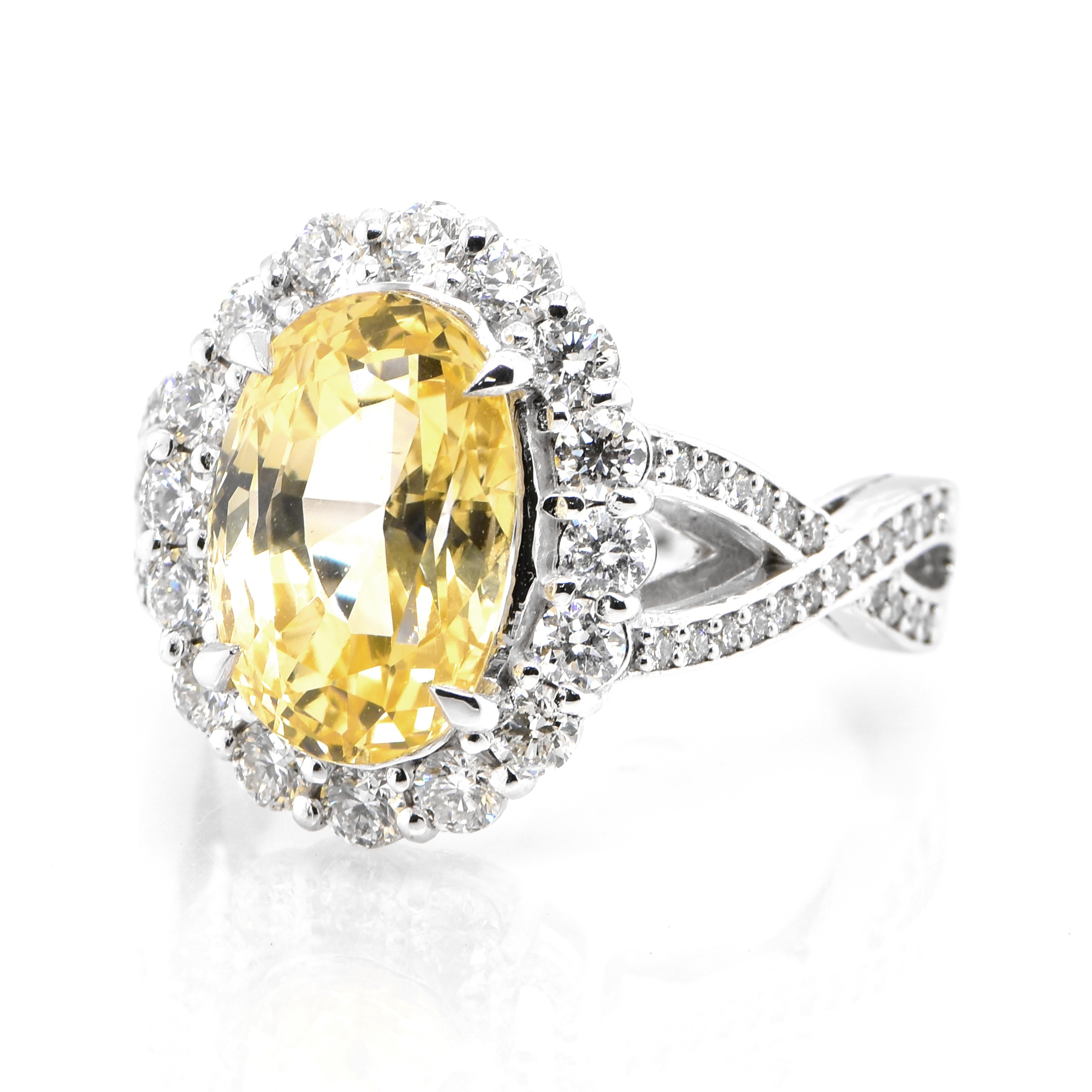 A beautiful ring featuring GIA Certified 7.33 Carat Natural Untreated Yellow Sapphire and 1.18 Carats Diamond Accents set in Platinum. Sapphires have extraordinary durability - they excel in hardness as well as toughness and durability making them